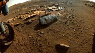 An image taken by the Perseverance rover on Mars shows a rock called Rochette with holes where the rover obtained its first two samples.