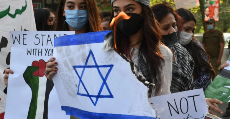 Activists protest Israeli air strikes in Gaza in Lahore, Pakistan