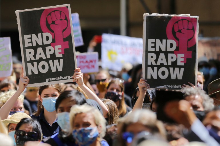 Protesters attend a rally against sexual violence and gender inequality in Sydney on March 15, 2021 [Steven Saphore/ AFP]