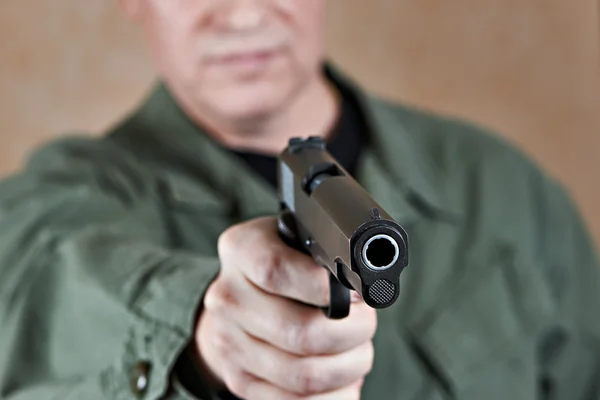 depositphotos_64049537-stock-photo-american-soldier-aiming-pistol.jpg