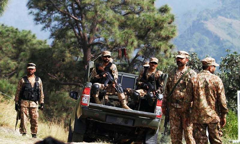 Pakistan Army soldiers patrol on the Line of Control.— AP/File