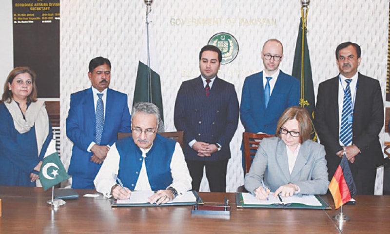 ECONOMIC Affairs Division Secretary Dr Kazim Niaz and German Development Bank Director Esther Gravenkotter sign the agreement for the second phase of Billion Tree Afforestation Project.—APP