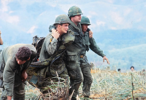 two-us-soldiers-aiding-wounded-vietnam.jpg