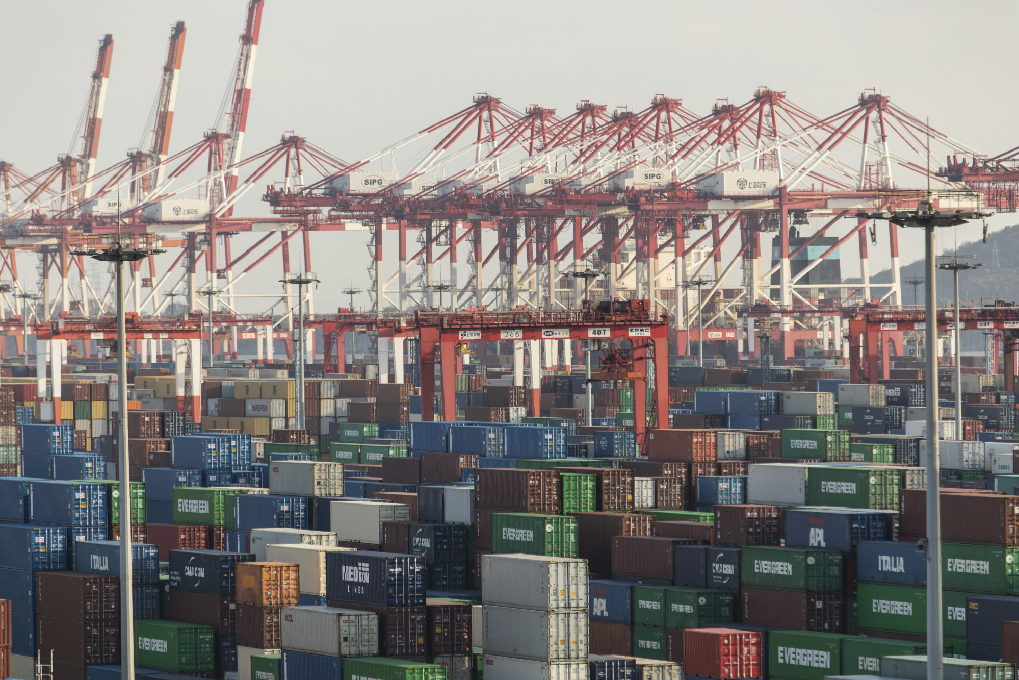 Cranes and shipping containers are seen at the Yangshan Deepwater Port in Shanghai, China in January. Photo: Bloomberg