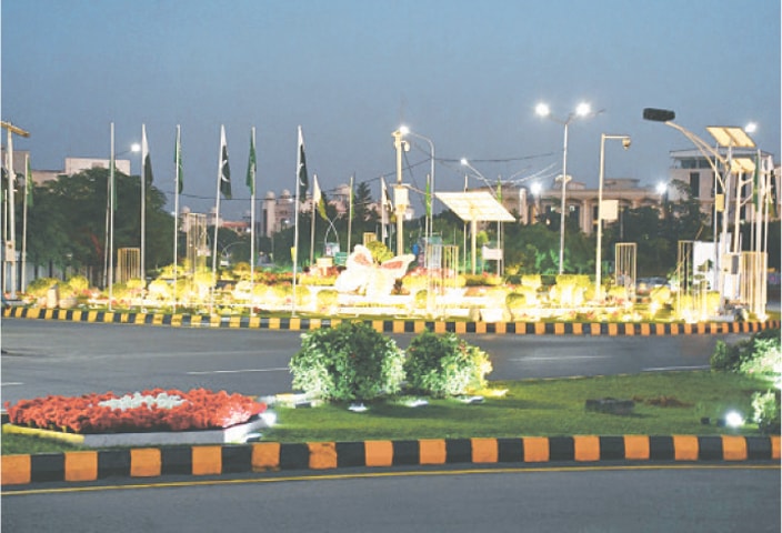  A beautiful view of Constitution Avenue, which has been decorated with colourful lights ahead of the upcoming Shanghai Cooperation Organisation (SCO) summit in Islamabad on Thursday. — Photo by Mohammad Asim 