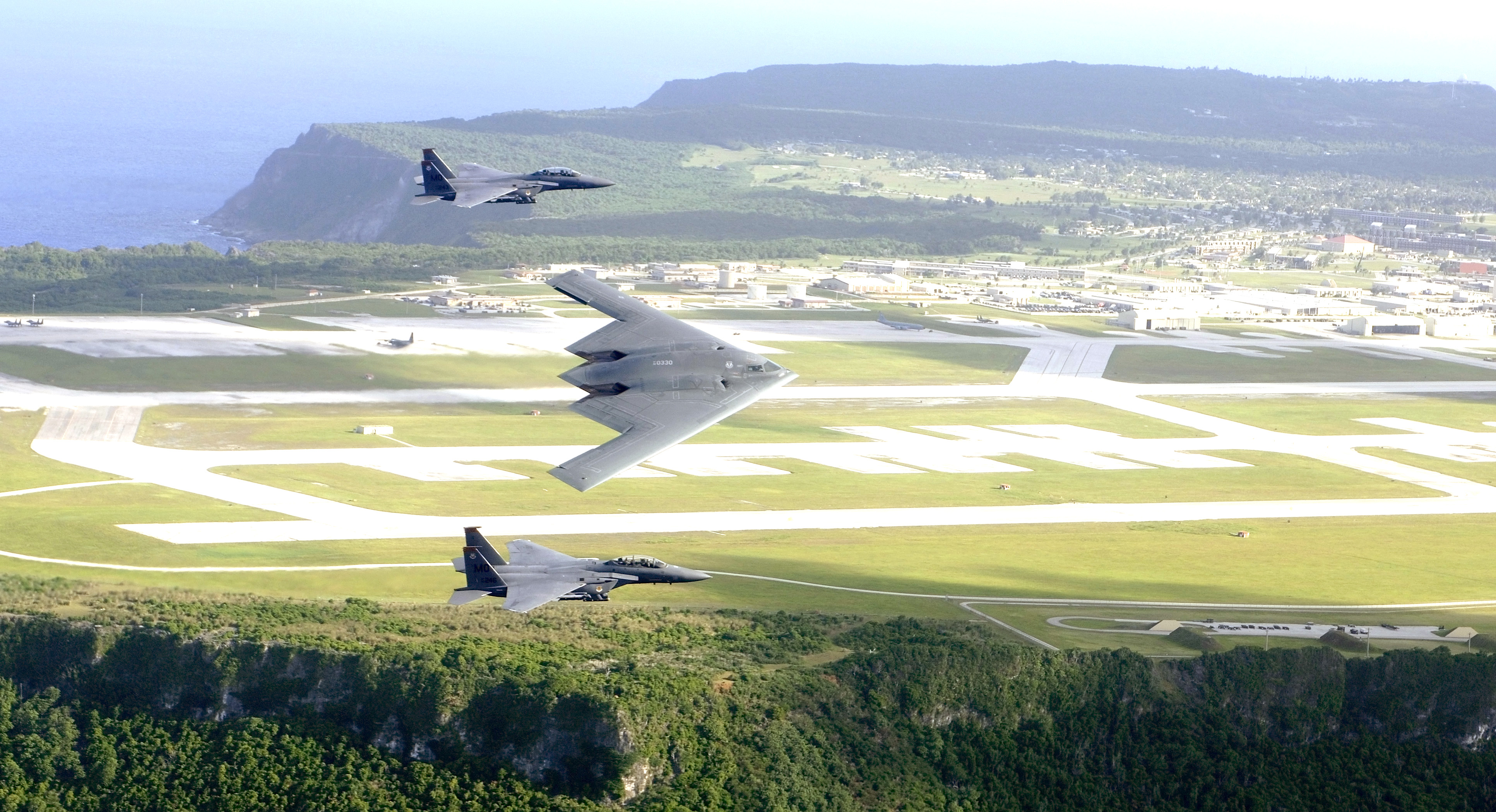 B-2_and_F-15_over_Andersen_Air_Force_Base.jpg