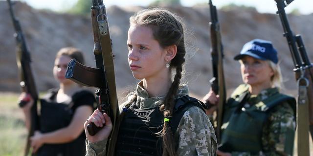 Ukrainian cadets wearing new military uniforms designed for women take part in a training session at a shooting range outside of Kyiv, Ukraine, in July 2023.STR/NurPhoto via Getty Images