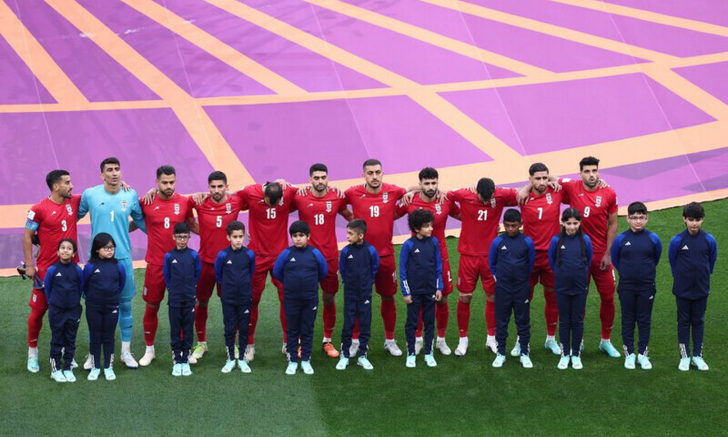 <p>Iran players line up during the national anthems before the World Cup match against England at Khalifa International Stadium, Doha, Qatar, Nov 21. — Reuters</p>