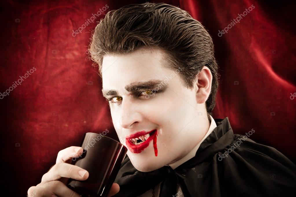 depositphotos_13325425-Male-vampire-Drinking-blood-smiling.jpg