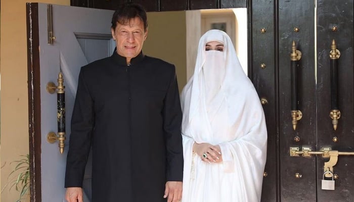 PTI Chairman Imran Khan with his wife Bushra Bibi. Courtesy PTI Twitter