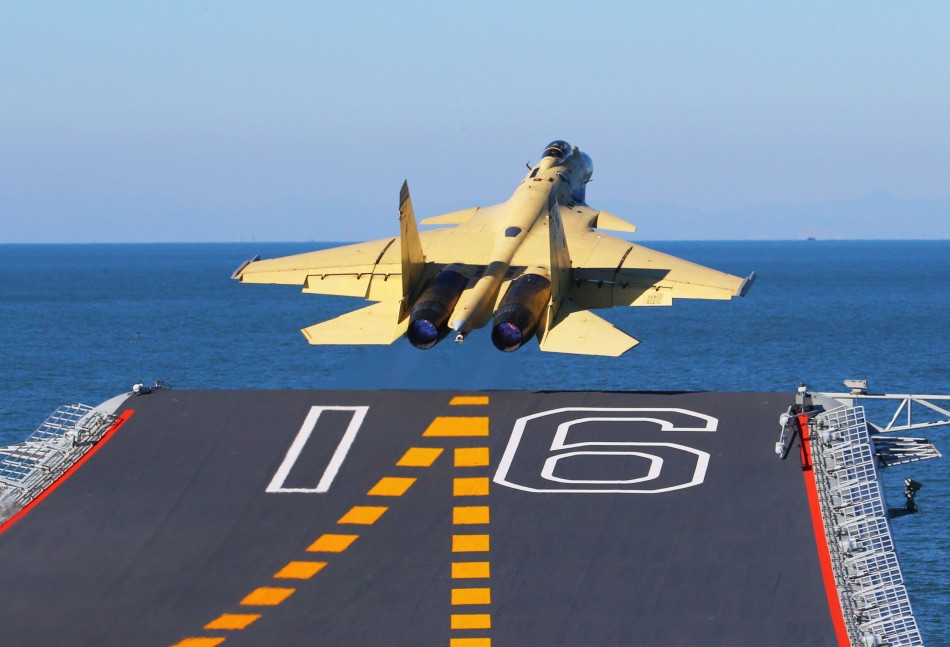 china-lands-fighter-jet-liaoning-aircraft-carrier.jpg