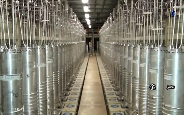 Various centrifuge machines line a hall at the Natanz Uranium Enrichment Facility, on April 17, 2021. (Screenshot, Islamic Republic Iran Broadcasting-IRIB, via AP)