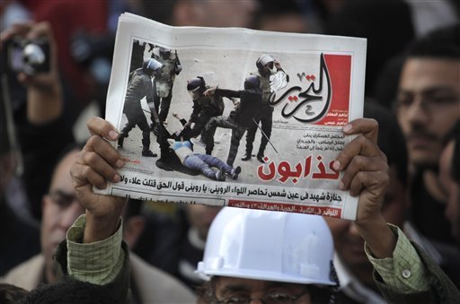 egypt-protest-beating-shirtless-woman-sign-liars-121811jpg-ee255c067eb00107.jpg