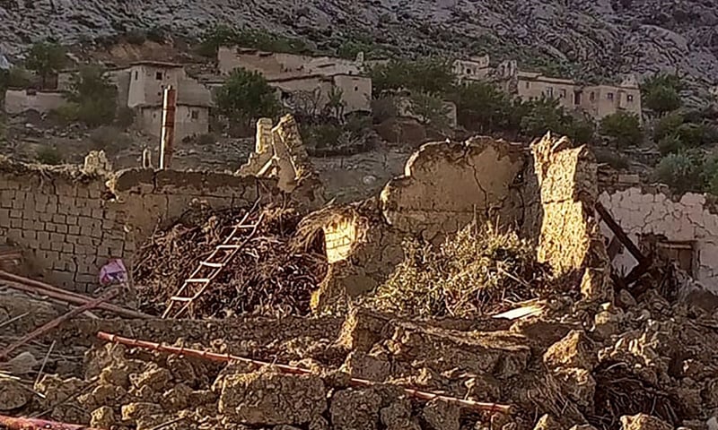 This photograph taken on June 22, 2022 and received as a courtesy of the Afghan government-run *Bakhtar News Agency* shows collapsed mud houses following an earthquake in Gayan district, Paktika province. — AFP