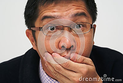 shocked-asian-businessman-1411484.jpg