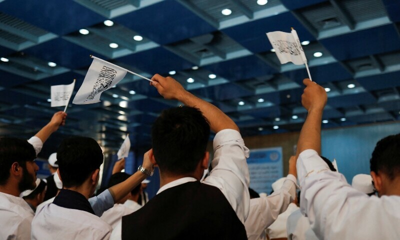 Taliban supporters hold an Islamic Emirate of Afghanistan flag at the second-anniversary ceremony of the takeover of Kabul by the Taliban in Kabul, Afghanistan, August 15, 2023. — Reuters