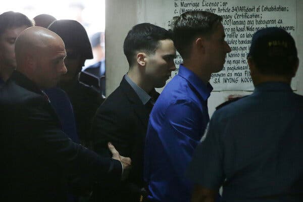 Lance Cpl. Joseph Scott Pemberton, center, arriving at court in Olongapo City, the Philippines, in December 2015. He was convicted of homicide in the 2014 death of Jennifer Laude, 26.