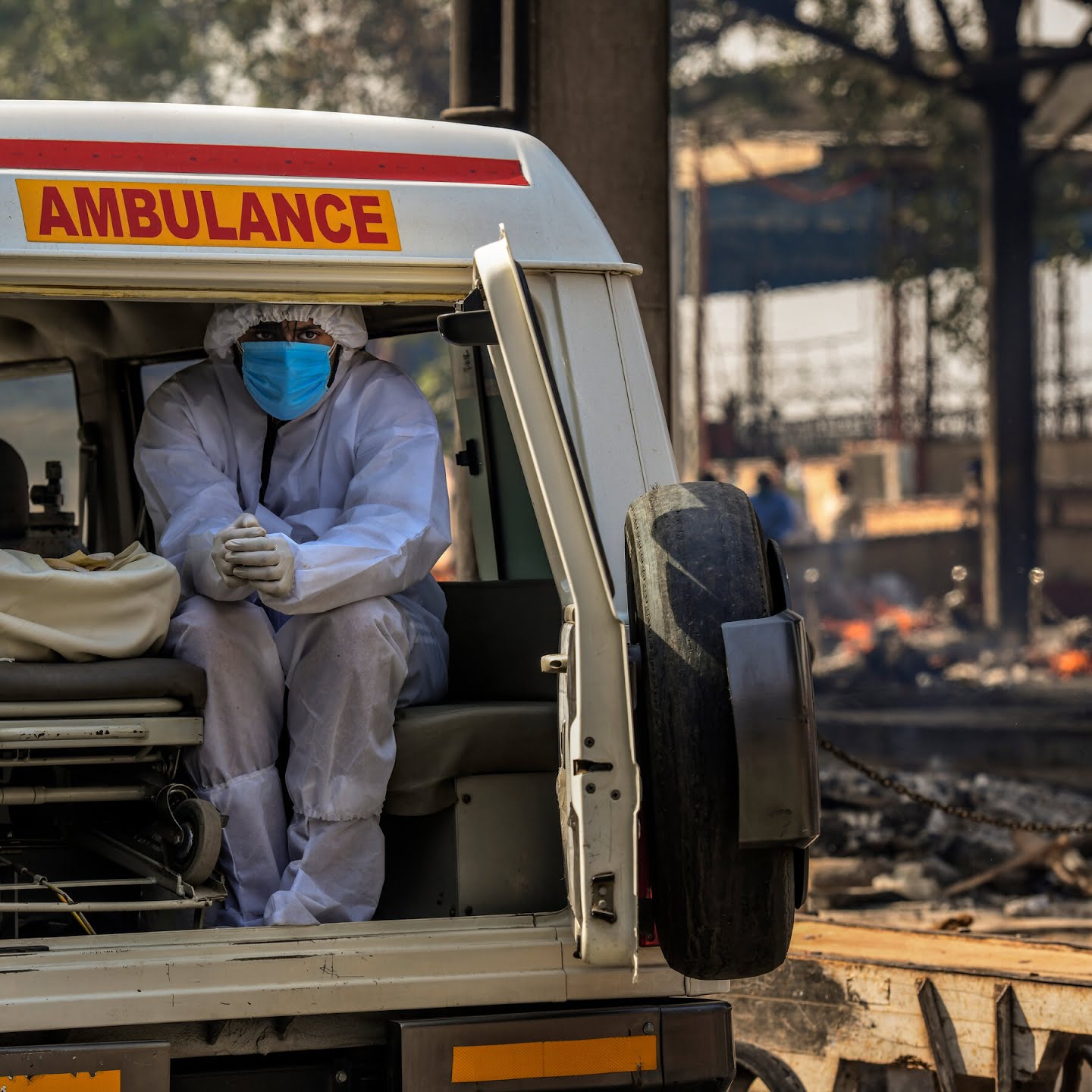 Waiting at a New Delhi crematorium to perform last rites for a relative.