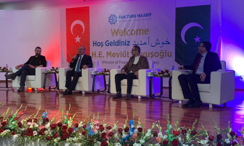 Turkish Foreign Minister Mevlut Cavusoglu attends an event at the Pak-Turk school along with two actors from the TV series Ertugrul. — Photo by Naveed Siddiqui