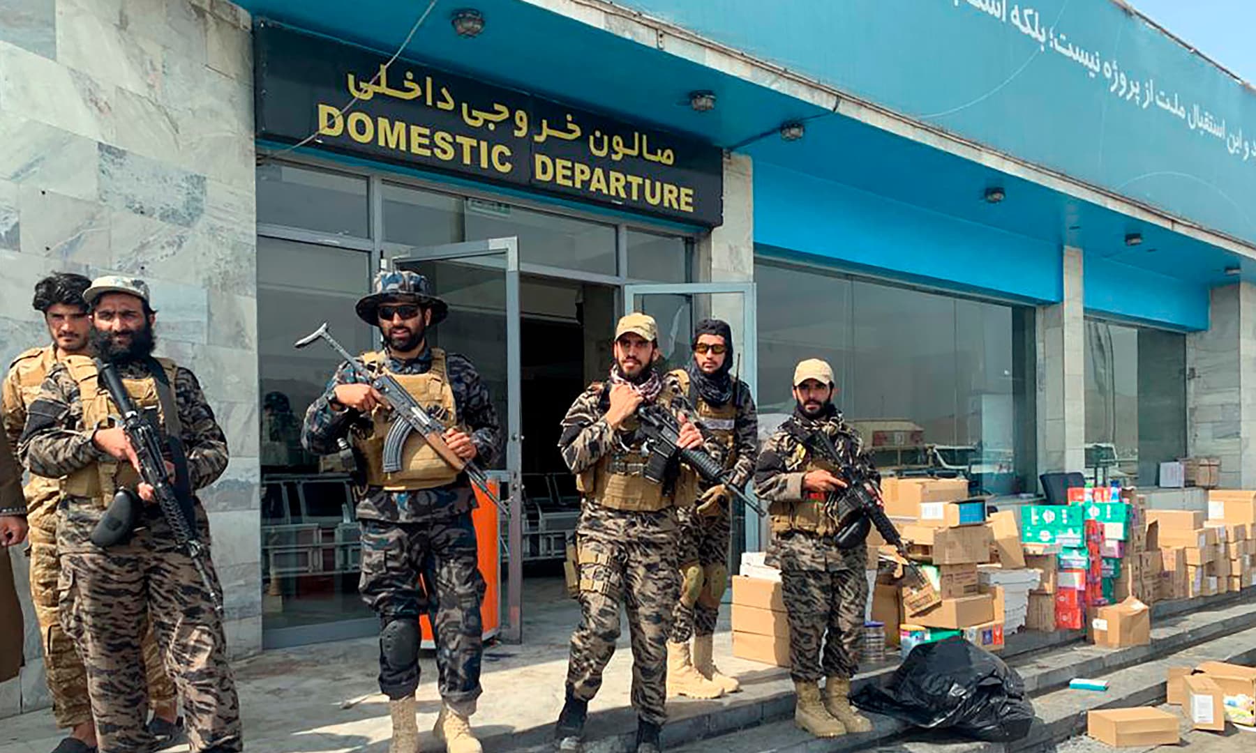 Taliban fighters stand guard inside the Hamid Karzai International Airport after the US withdrawal in Kabul, Afghanistan on August 31, 2021. — AP