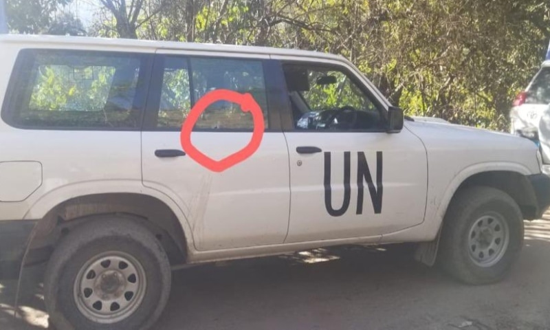 A bullet hole is seen on the UN vehicle targeted by Indian troops on Friday. — Photo: ISPR