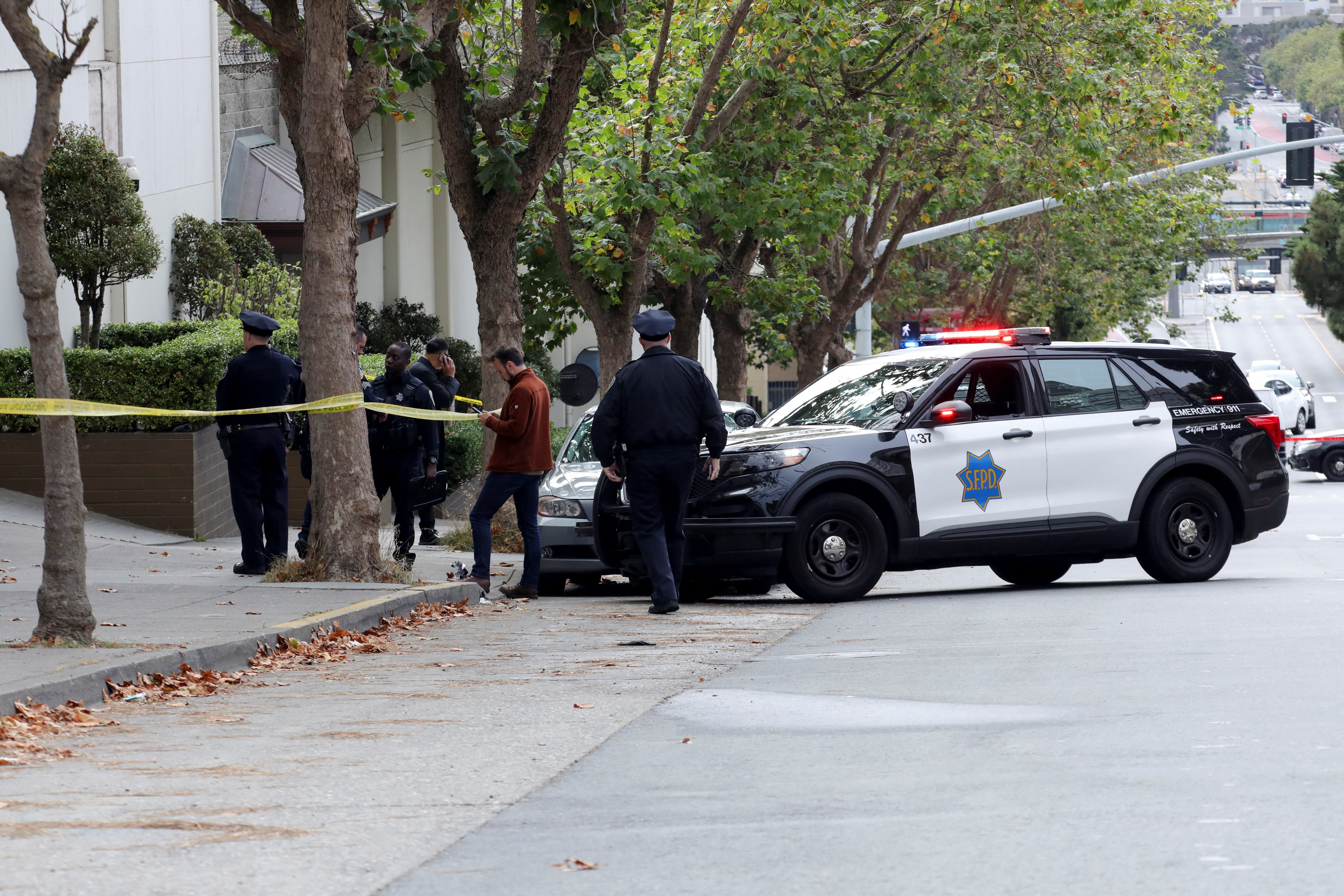 <p>Law enforcement members stand on the street near the Chinese consulate, where local media has reported a vehicle may have crashed into the building, in San Francisco, California, U.S. October 9, 2023</p>