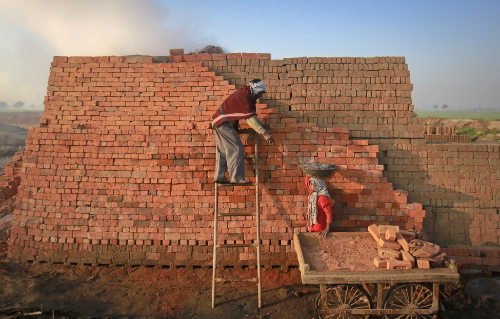 reuters_india_brick_maker_22Jan13-975x622.jpg