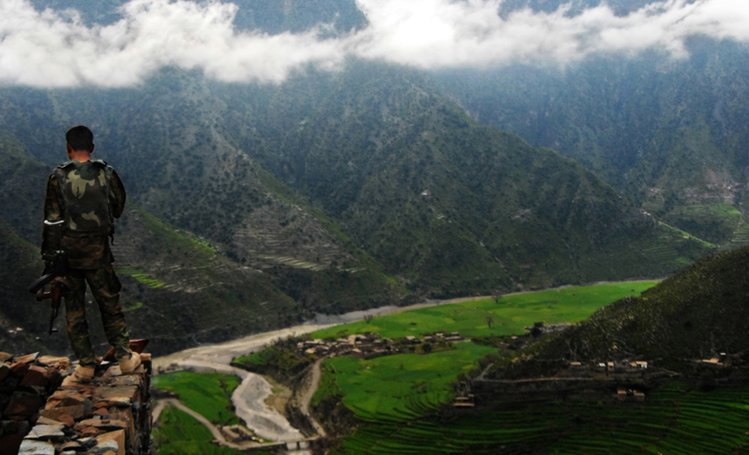 Afghan_National_Army_Soldier_Monitors_Outpost_in_Konar_Province.jpg