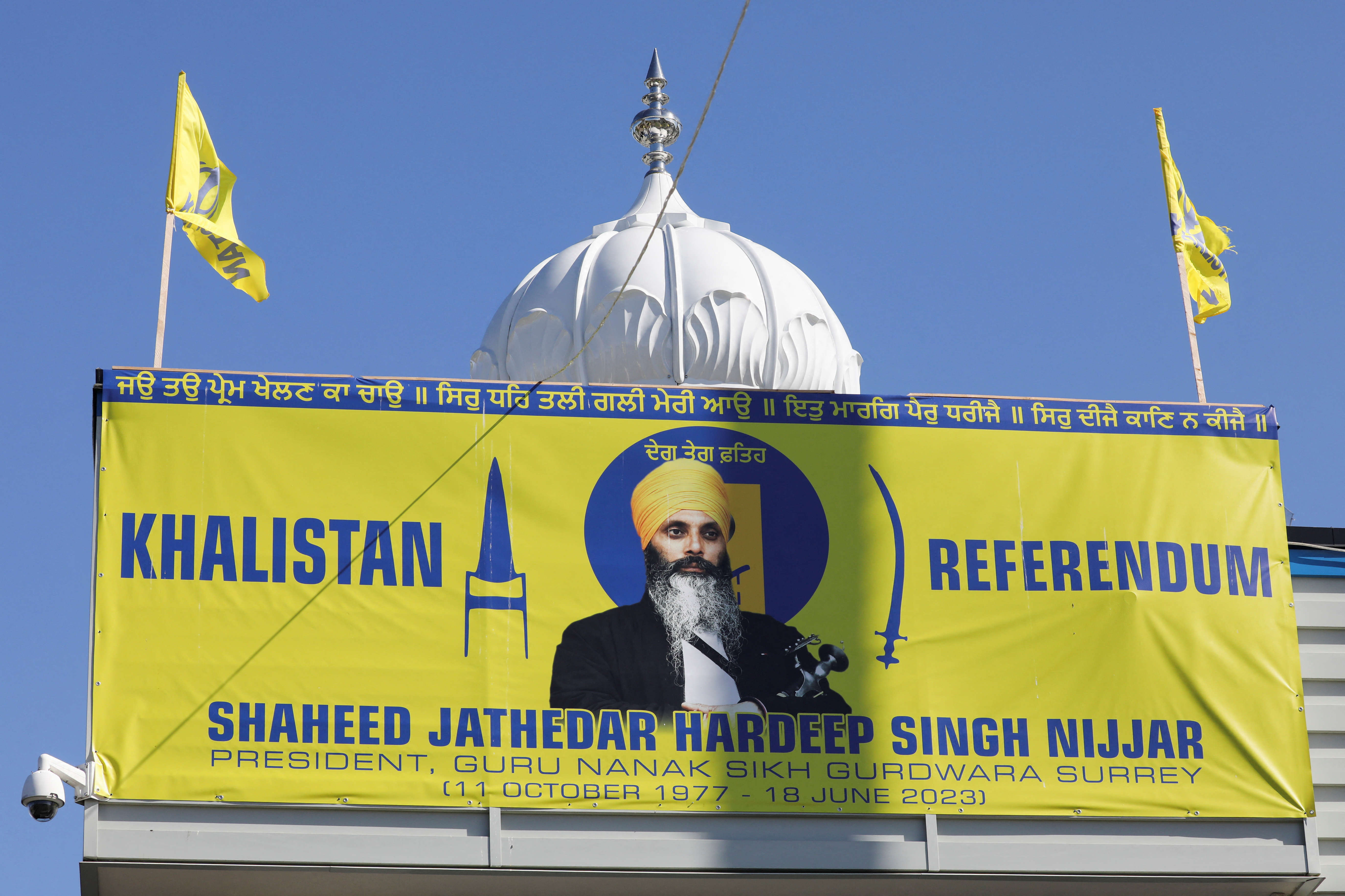 A sign outside the Guru Nanak Sikh Gurdwara temple is seen after the killing on its grounds in June 2023 of Sikh leader Hardeep Singh Nijjar, in Surrey