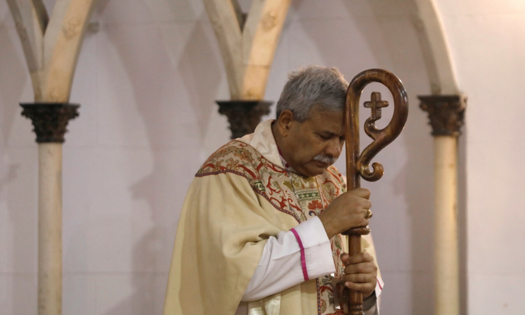 Bishop Humphrey Sarfaraz Peters leads a Christmas Day service at the St John’s Cathedral in Peshawar on December 25, 2022. — Reuters