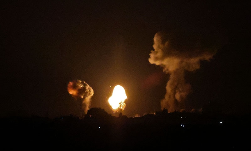 Smoke and fireball rises following an air strike in Khan Younis in the southern Gaza strip on January 2, 2022. — AFP