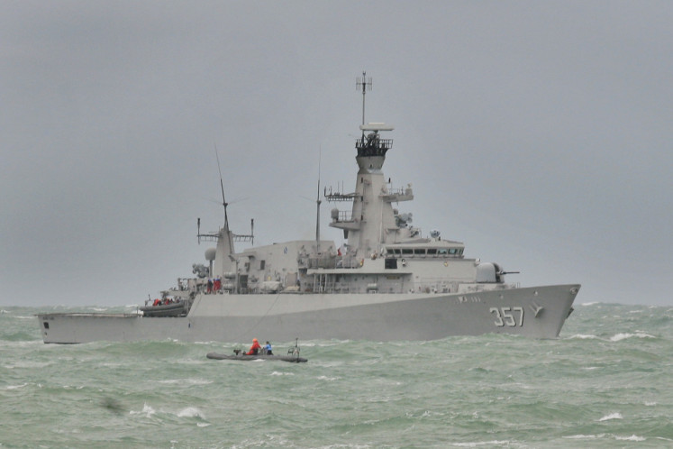 The British-made KRI Bung Tomo 357 multirole light frigate is on station in the Karimata Strait on Dec. 31, 2014, as it assists in the search for the missing AirAsia flight QZ8501. 