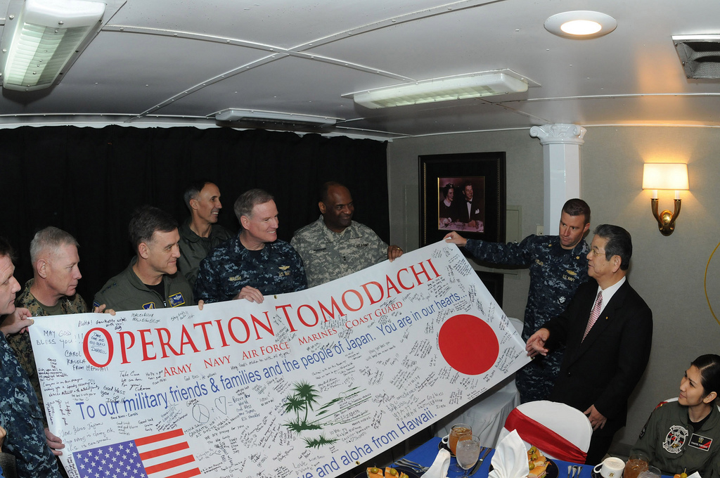 Toshimi_Kitazawa_receives_an_Operation_Tomodachi_banner.jpg