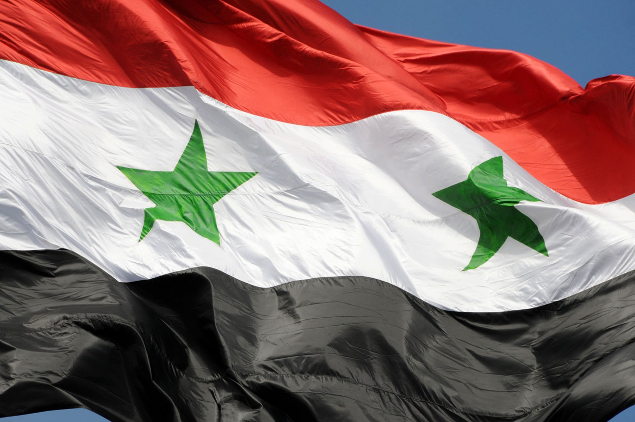 The_flag_of_Syrian_Arab_Republic_Damascus,_Syria.jpg